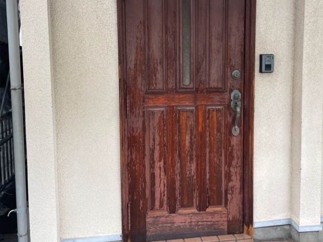 玄関ドア　塗膜剥がれ　劣化